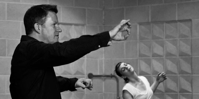 Matthew Bourne in rehearsals with Kerry Biggin as Cinderella