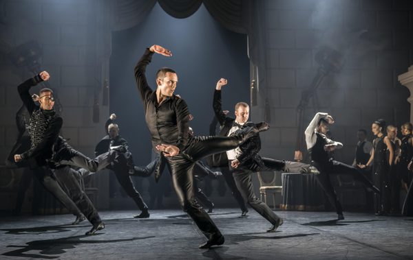 The Stranger (Will Bozier) and Escorts at The Royal Ball in Matthew Bourne's Swan Lake